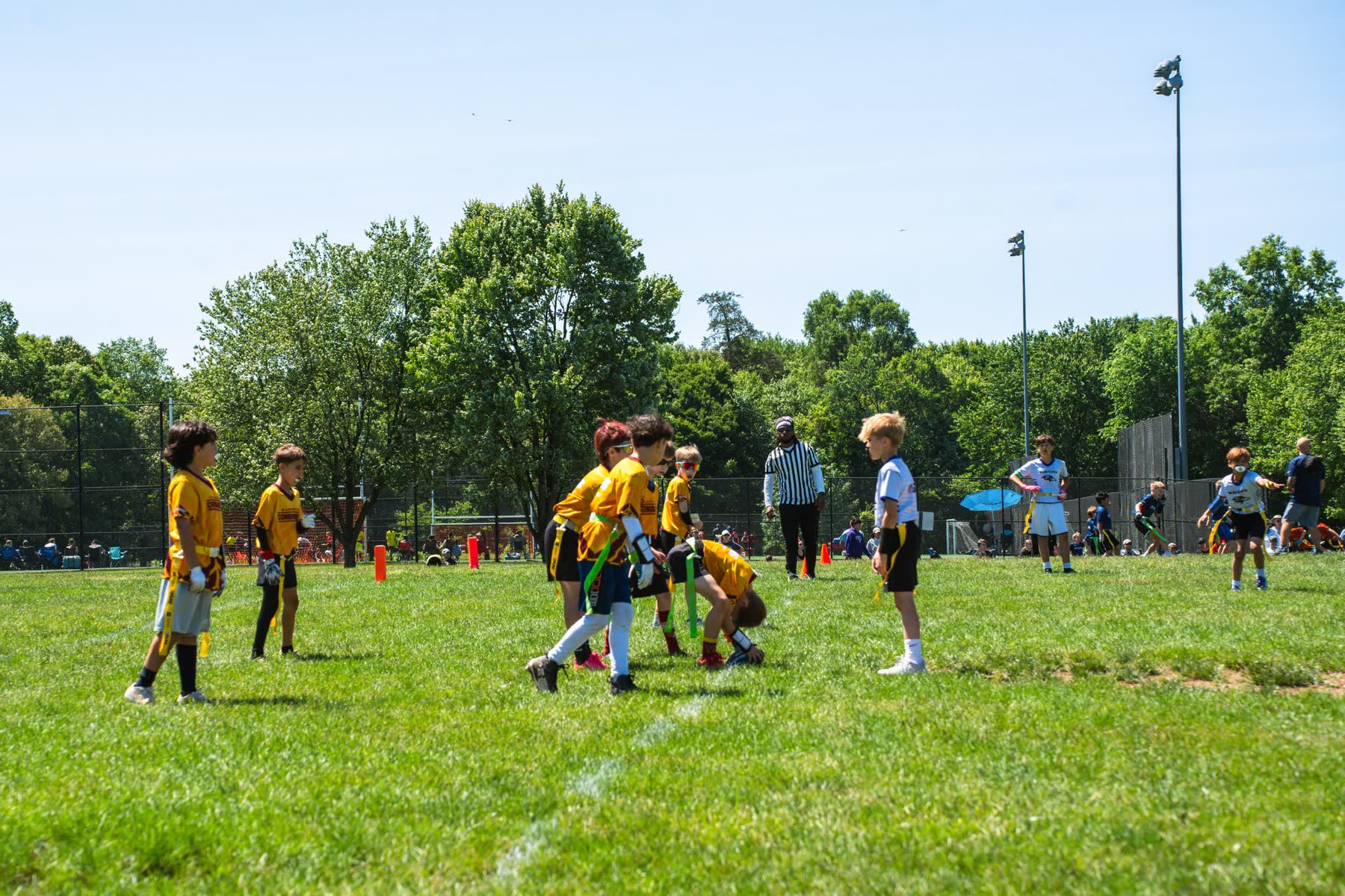 A wide view of a Saturday flag game at the fields